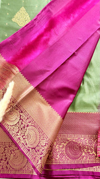 Kanchipuram silk saree featuring a pista green solft silk saree a rich purple and zari women traditional border  (Saree Code - S101)