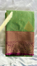 Kanchipuram silk saree featuring a pista green solft silk saree a rich purple and zari women traditional border  (Saree Code - S101)