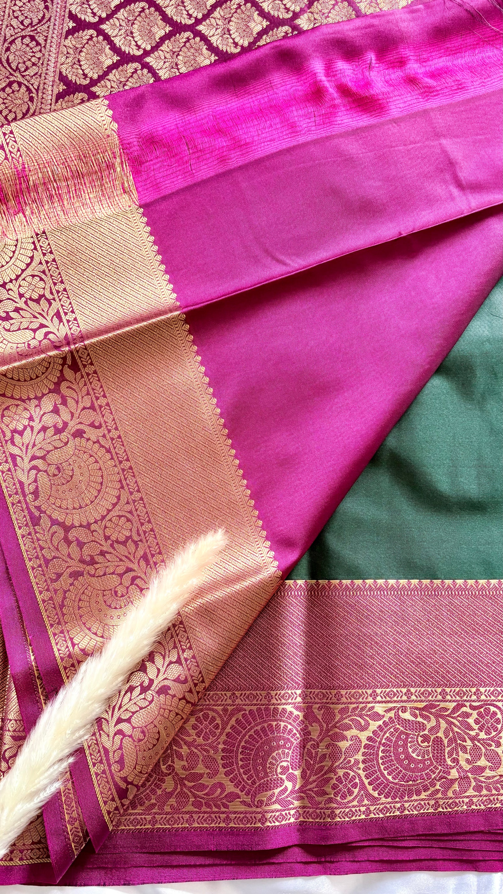 Green and Purple Kanchipuram silk saree features an elegant contract zari border and intricate traditional motifs  (Saree Code - S102)
