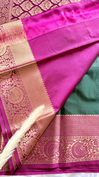 Green and Purple Kanchipuram silk saree features an elegant contract zari border and intricate traditional motifs  (Saree Code - S102)