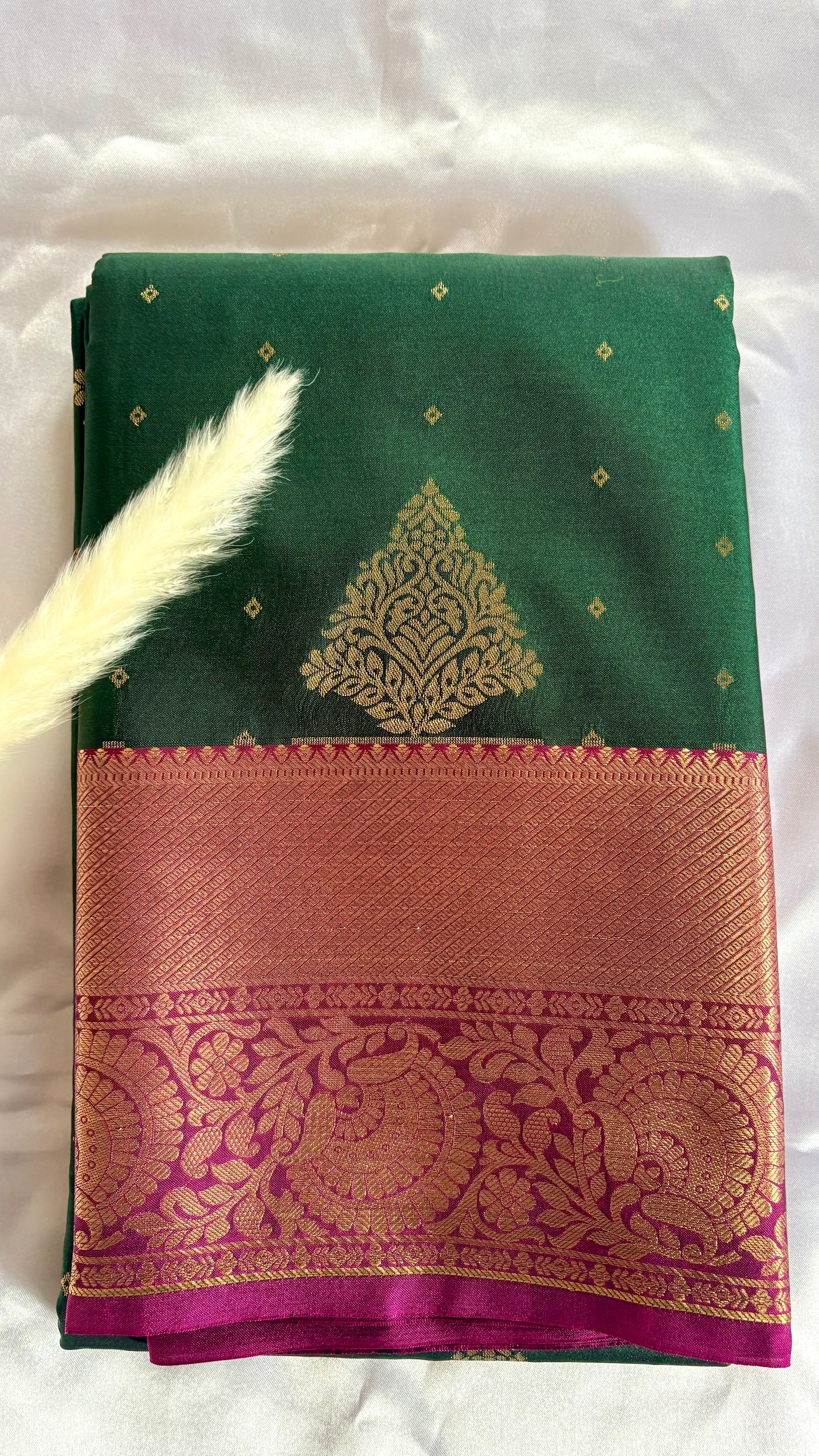 Green and Purple Kanchipuram silk saree features an elegant contract zari border and intricate traditional motifs  (Saree Code - S102)