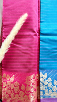 Soft silk saree features a detailed gold zari woven floral border and a subtle horizontal stripes  (Saree Code - S103)