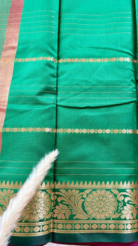 Deep Magenta soft silk saree featuring a traditional golden zari woven floral border and horizontal line accents  (Saree Code - S104)