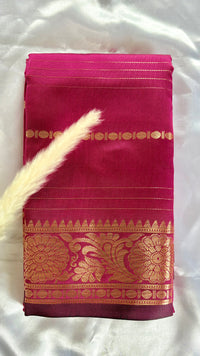 Deep Magenta soft silk saree featuring a traditional golden zari woven floral border and horizontal line accents  (Saree Code - S104)