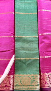 Deep Magenta soft silk saree featuring a traditional golden zari woven floral border and horizontal line accents  (Saree Code - S104)