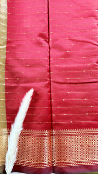 Soft silk canary yellow check pattern complemented by a broad, ornate silver zari woven border  (Saree Code - S105)