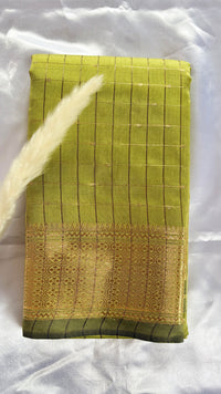 Soft silk canary yellow check pattern complemented by a broad, ornate silver zari woven border  (Saree Code - S105)