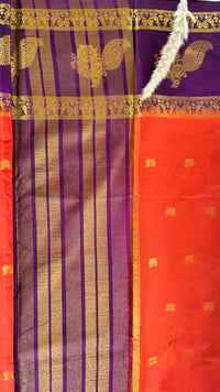 Featuribg an Orange body and a Wine-Coloured Border, Intircately woven with traditional goldern zari motifs (Saree Code - S72)