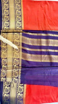 Vibrant Orange silk saree featuring a traditional woven golden zari peacock and floral motif border (Saree Code - S74)