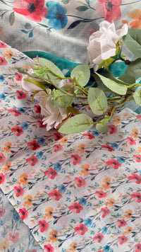 Off-white and green chanderi cotton silk saree featuring a delictae watercolor-style floral stripe across the body and a stripped green border ( (Saree Code - S81)