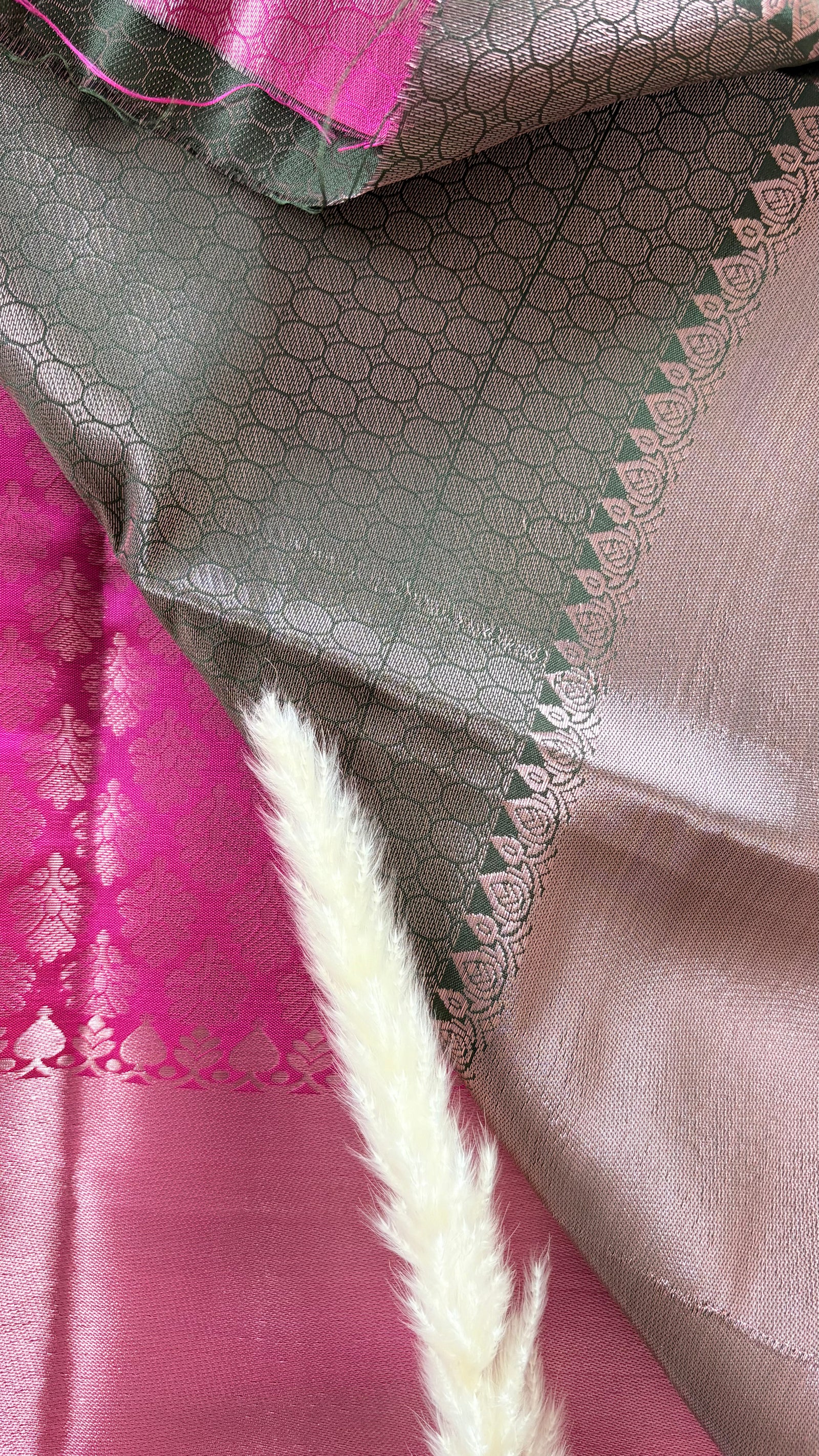 Kanchipuram Tissue Silk Saree in a ruby pink and magenta brocade Zari weaving throughout body and a solid metallic border ( (Saree Code - S93)