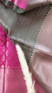 Kanchipuram Tissue Silk Saree in a ruby pink and magenta brocade Zari weaving throughout body and a solid metallic border ( (Saree Code - S93)