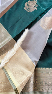 Teal Green Kanchipuram-inspried semi-pattu silk saree, featuring intricate all-over floral leaf zari motifs and a contract metallic tissue border  (Saree Code - S97)