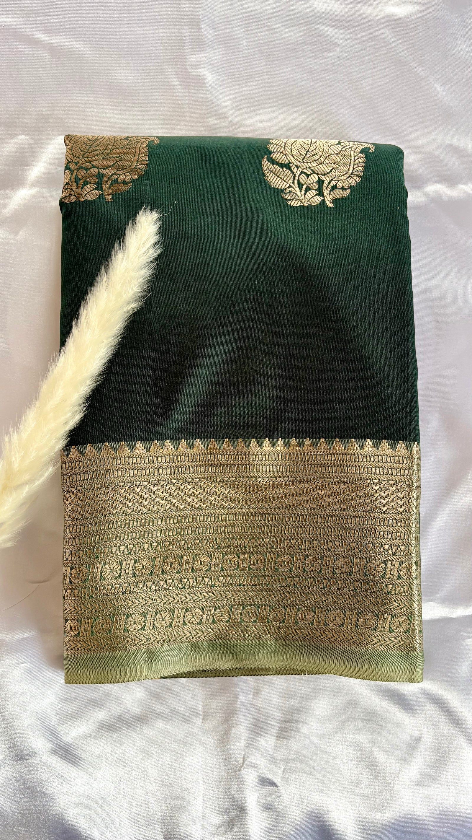 Teal Green Kanchipuram-inspried semi-pattu silk saree, featuring intricate all-over floral leaf zari motifs and a contract metallic tissue border  (Saree Code - S97)