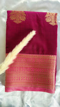 Maroon Kanchipuram soft silk saree adorned with traditional gold zari bootis and an intricate geometric patterned border  (Saree Code - S98)