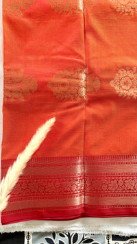 Orange Kanchipuram soft silk saree adorned with traditional gold zari bootis and pink border  (Saree Code - S99)